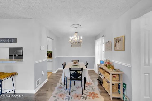a view of a workspace with furniture