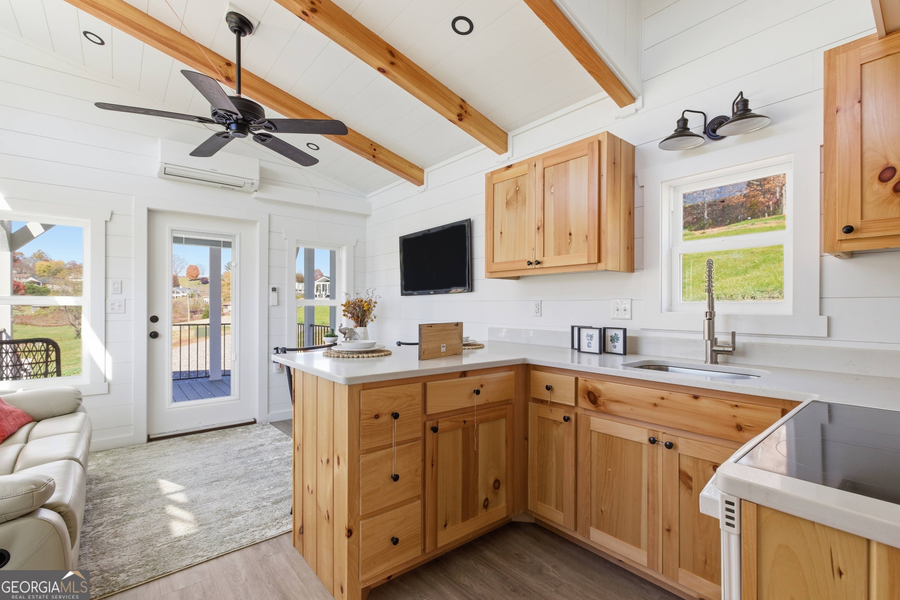 527 Saunders Road Franklin, NC 28734 - Photo 13 of 22 a kitchen with a sink cabinets and window
