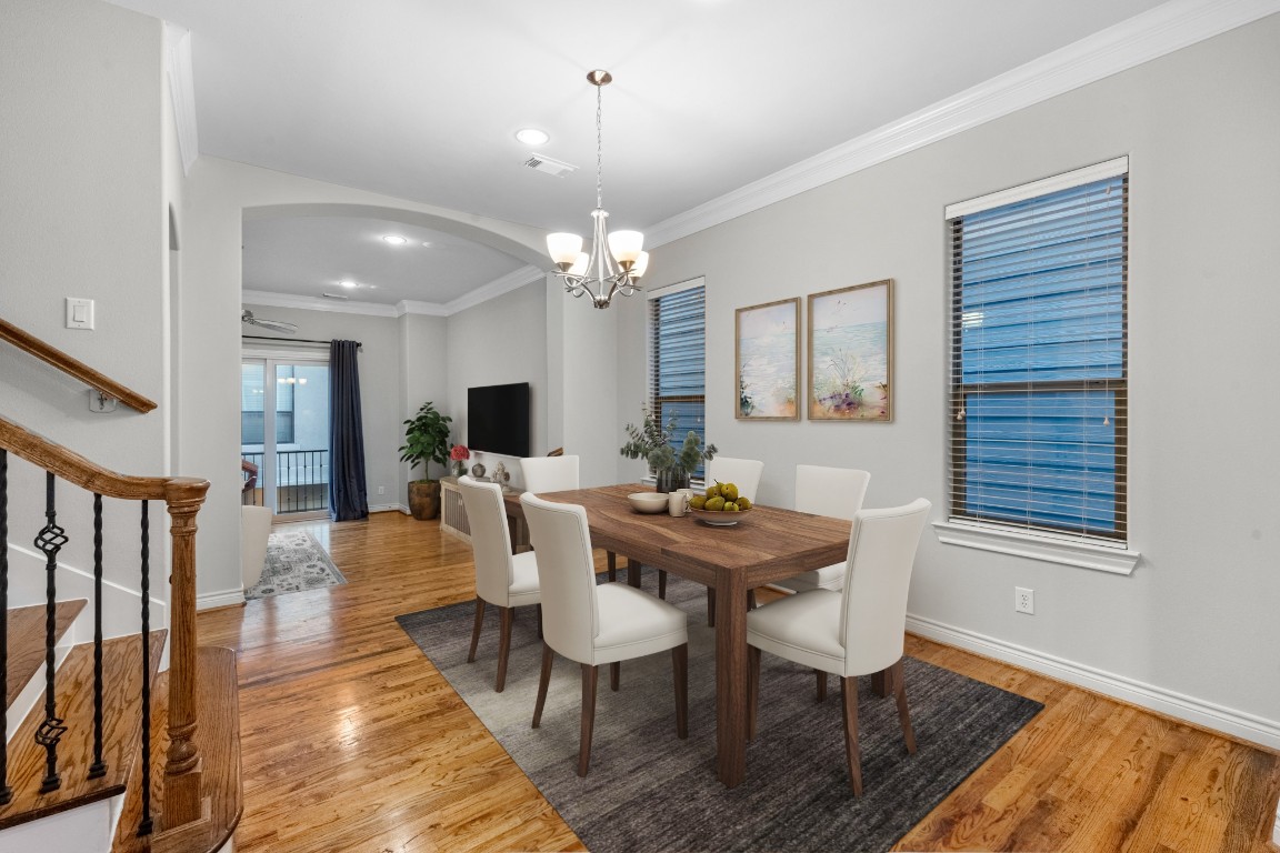 3414 Center Street Houston, TX 77007 - Photo 17 of 35 a view of a dining room with furniture and wooden floor
