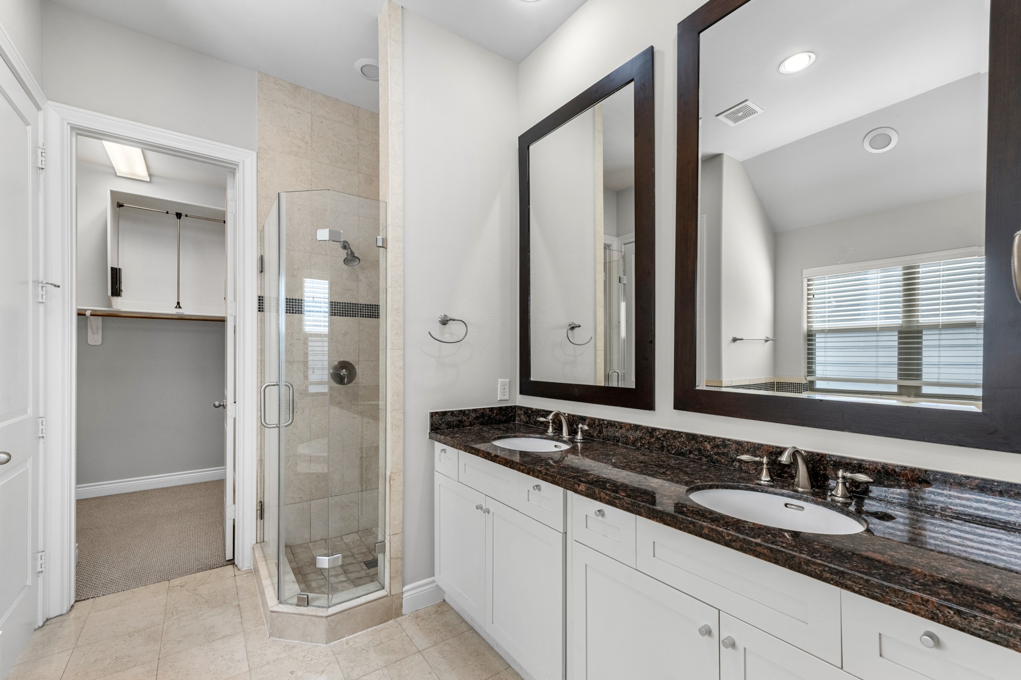 3414 Center Street Houston, TX 77007 - Photo 23 of 35 a bathroom with a granite countertop sink mirror and double