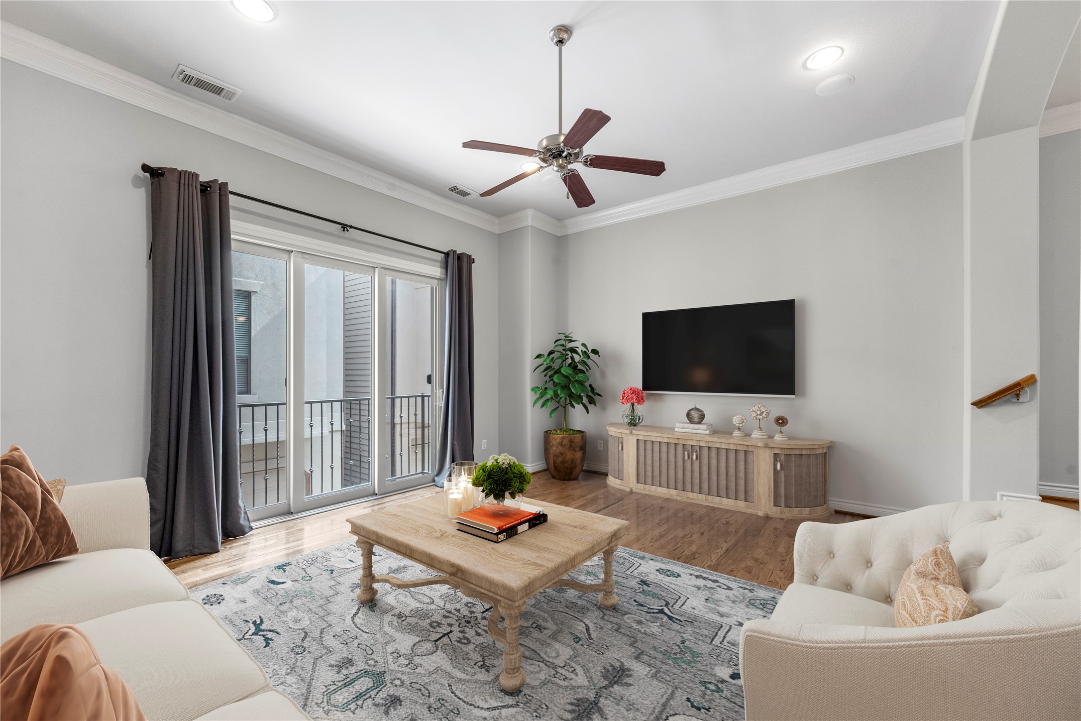 3414 Center Street Houston, TX 77007 - Photo 8 of 35 a living room with furniture and a flat screen tv