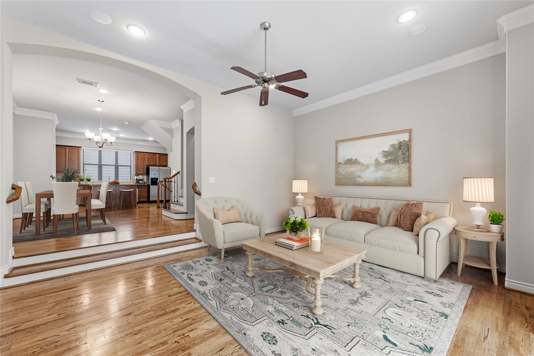 3414 Center Street Houston, TX 77007 - Photo 10 of 35 a living room with furniture and a dining table with wooden floor