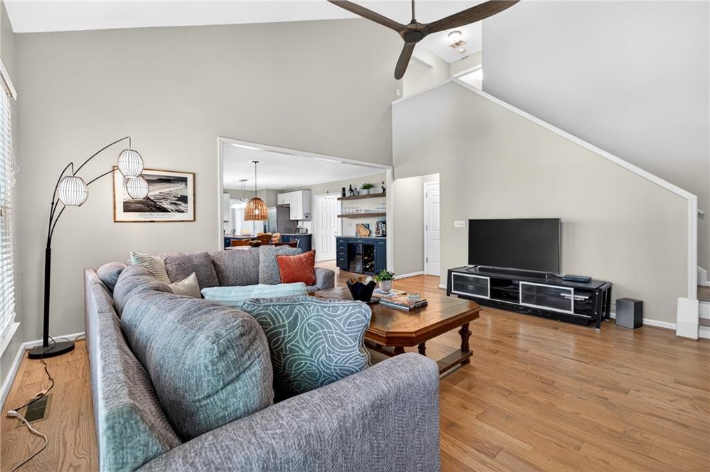 7830 Llangollen Way Cumming, GA 30041 - Photo 14 of 60 a living room with furniture and a flat screen tv