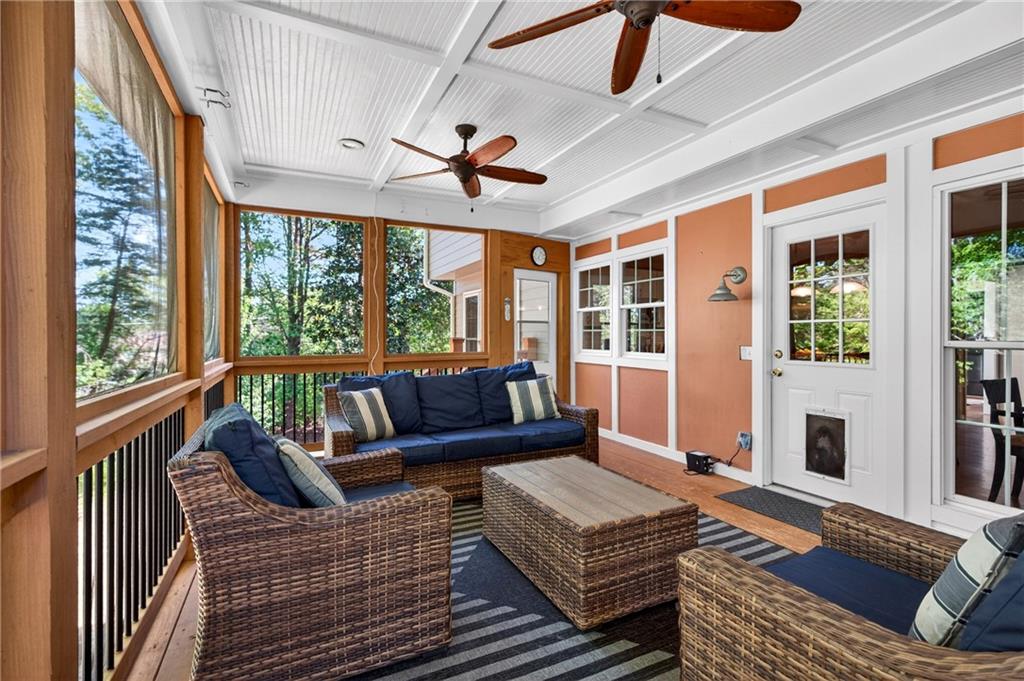 7830 Llangollen Way Cumming, GA 30041 - Photo 25 of 60 a living room with furniture and a window