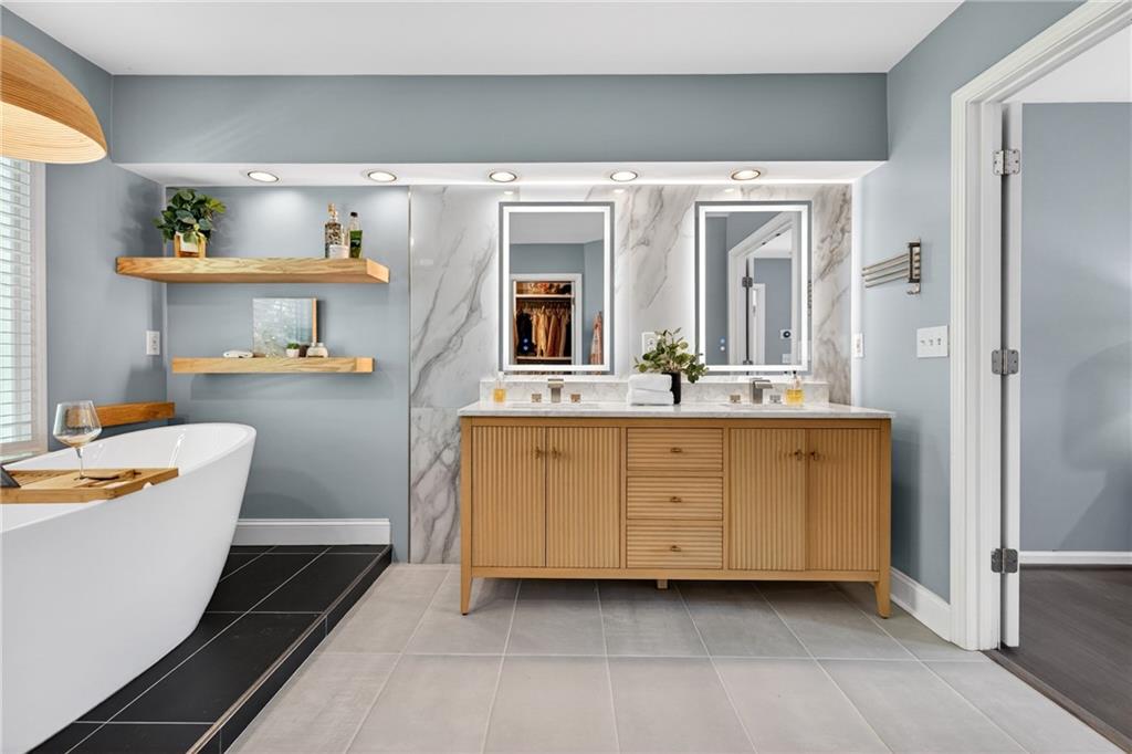 7830 Llangollen Way Cumming, GA 30041 - Photo 32 of 60 a room with a cabinets and gym equipment