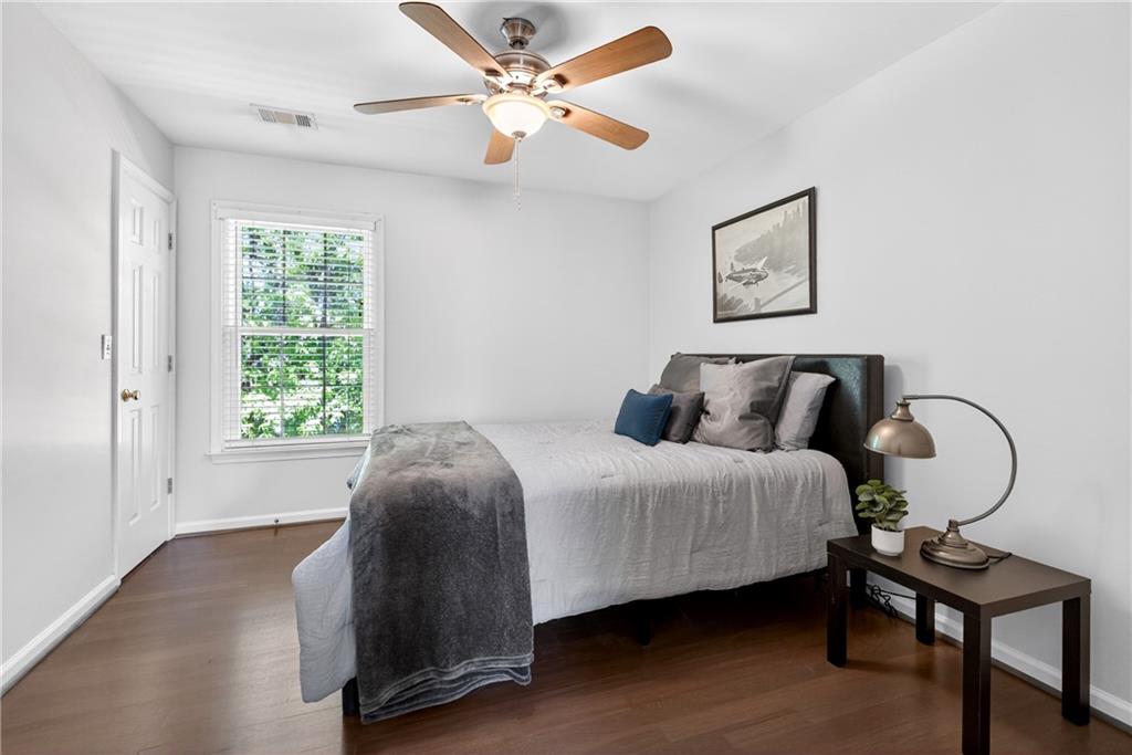 7830 Llangollen Way Cumming, GA 30041 - Photo 39 of 60 a bedroom with bed and a window