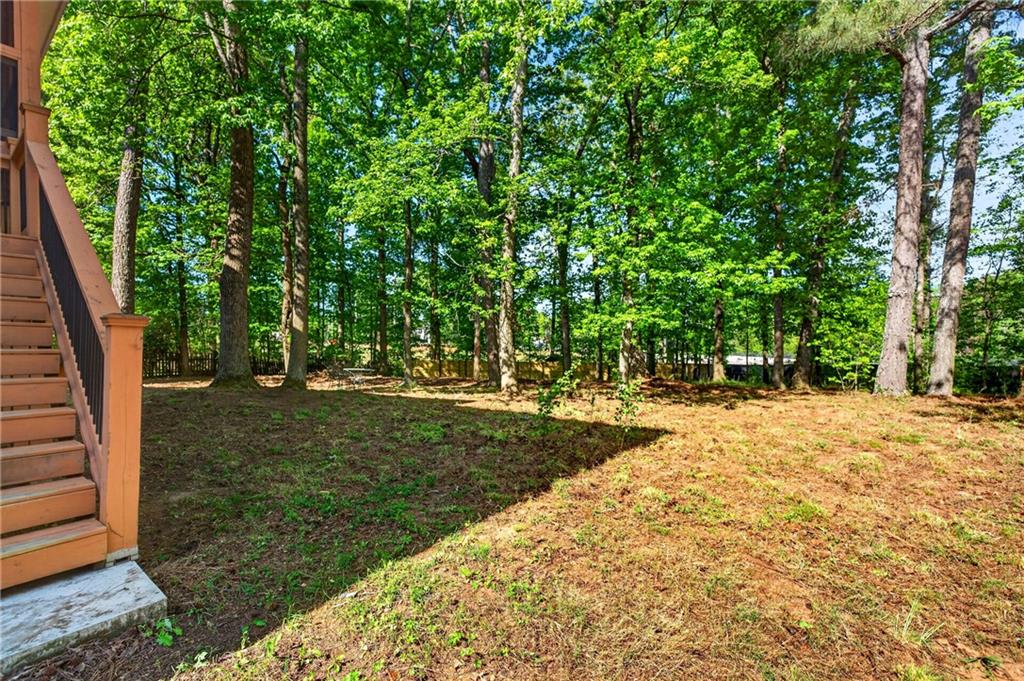 7830 Llangollen Way Cumming, GA 30041 - Photo 54 of 60 a view of backyard with green space