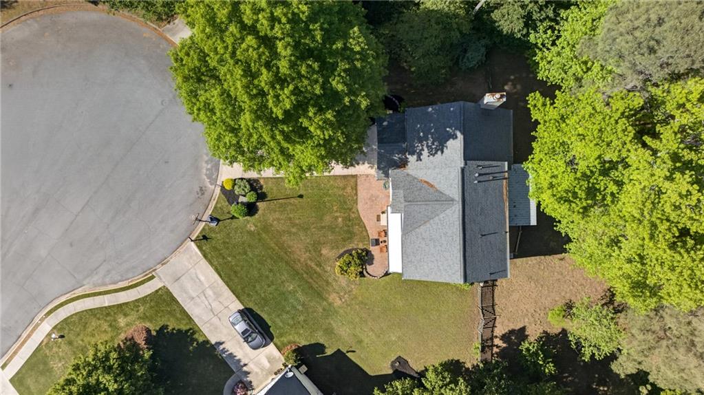 7830 Llangollen Way Cumming, GA 30041 - Photo 56 of 60 an aerial view of a house with a yard