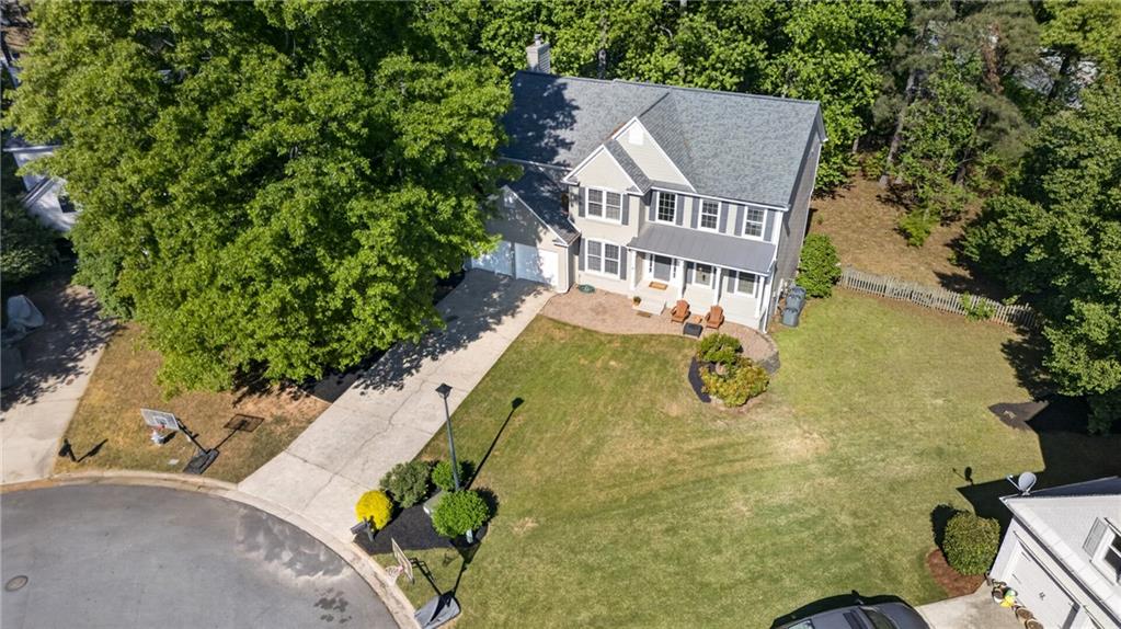 7830 Llangollen Way Cumming, GA 30041 - Photo 59 of 60 a view of a swimming pool with a patio