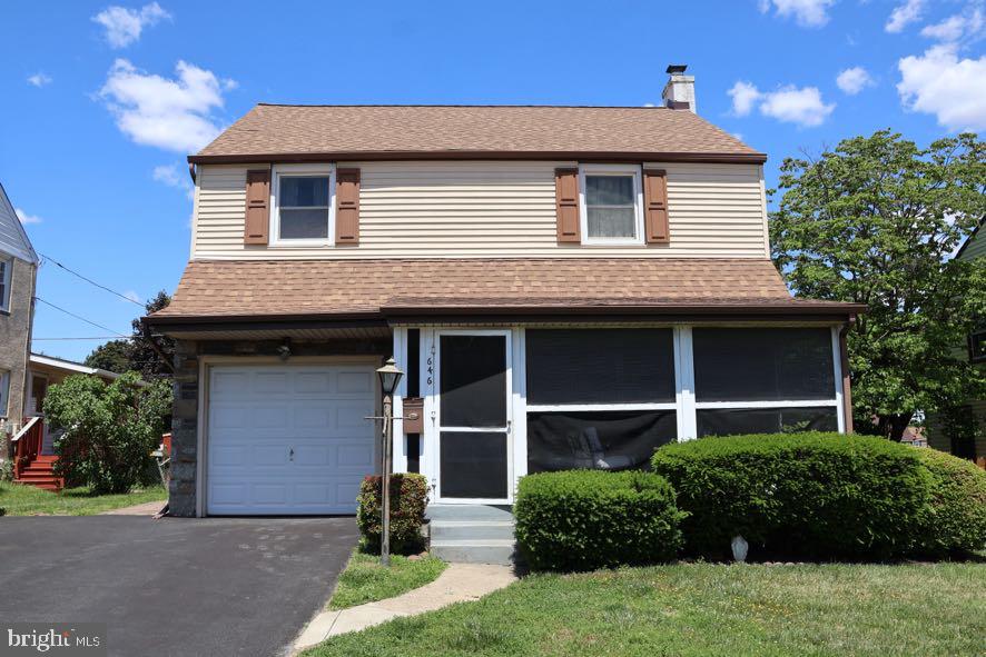 646 Amosland Road Morton, PA 19070 - Photo 10 of 11 Charming two-story home with greenery.