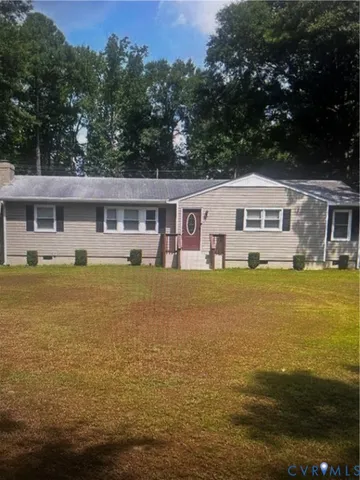 a view of a lake with a house in the background with a lake view