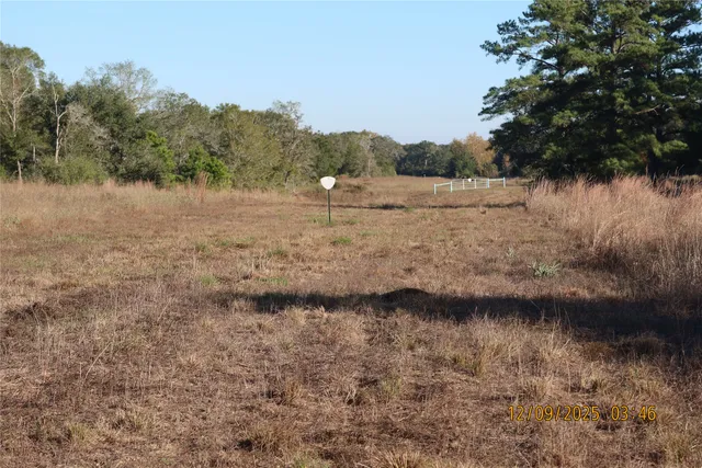 a view of lake with a mountain