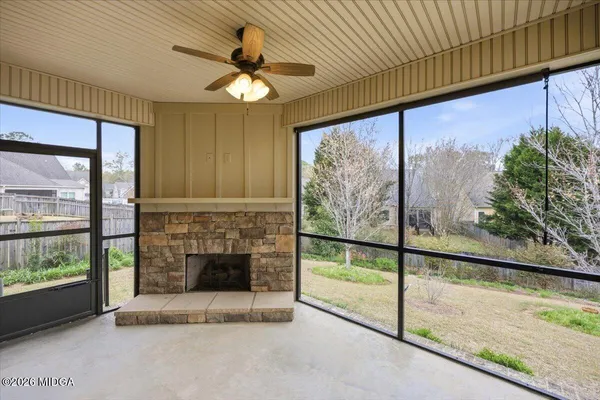 a living room with fireplace