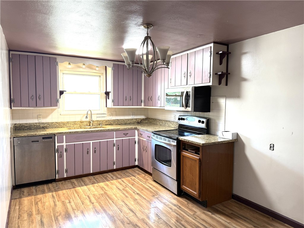 4732 Lehigh Drive Springfield, OH 45503 - Photo 26 of 27 This bright kitchen features ample cabinetry and modern appliances, perfect for everyday living.