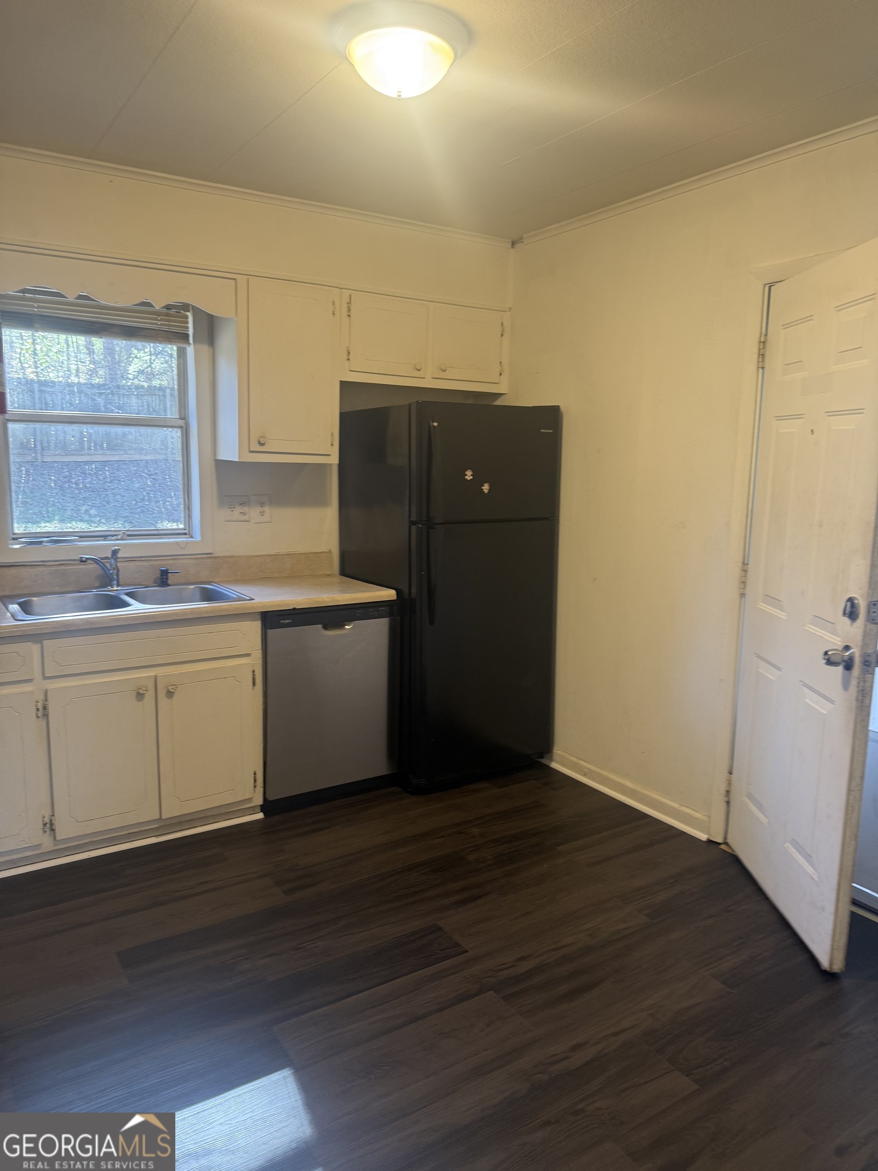 44 Armstead Drive Stockbridge, GA 30281 - Photo 13 of 20 a view of a kitchen with wooden floor