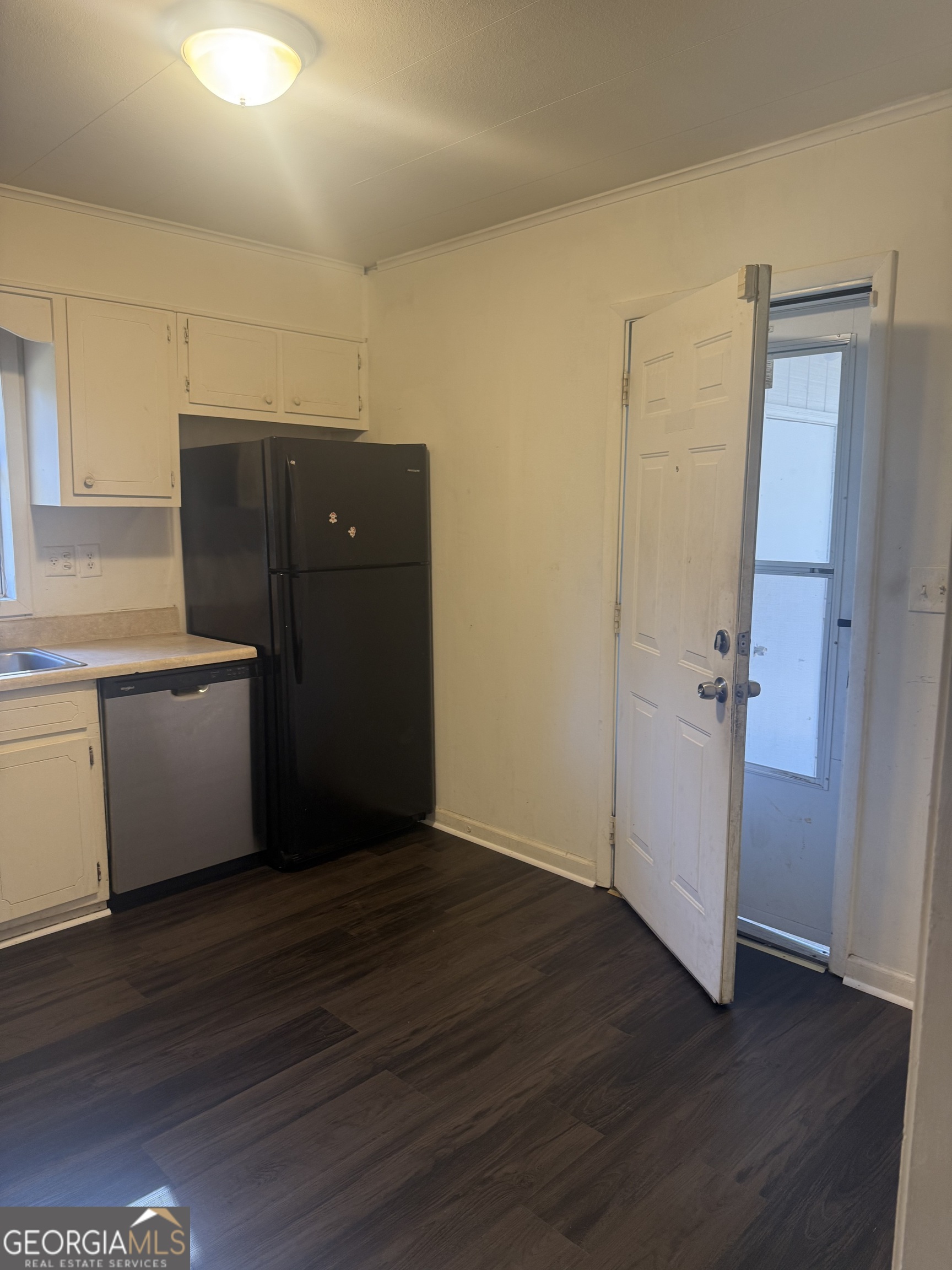 44 Armstead Drive Stockbridge, GA 30281 - Photo 14 of 20 a view of a kitchen with wooden floor