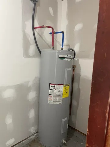 a view of storage and utility room with washer and dryer