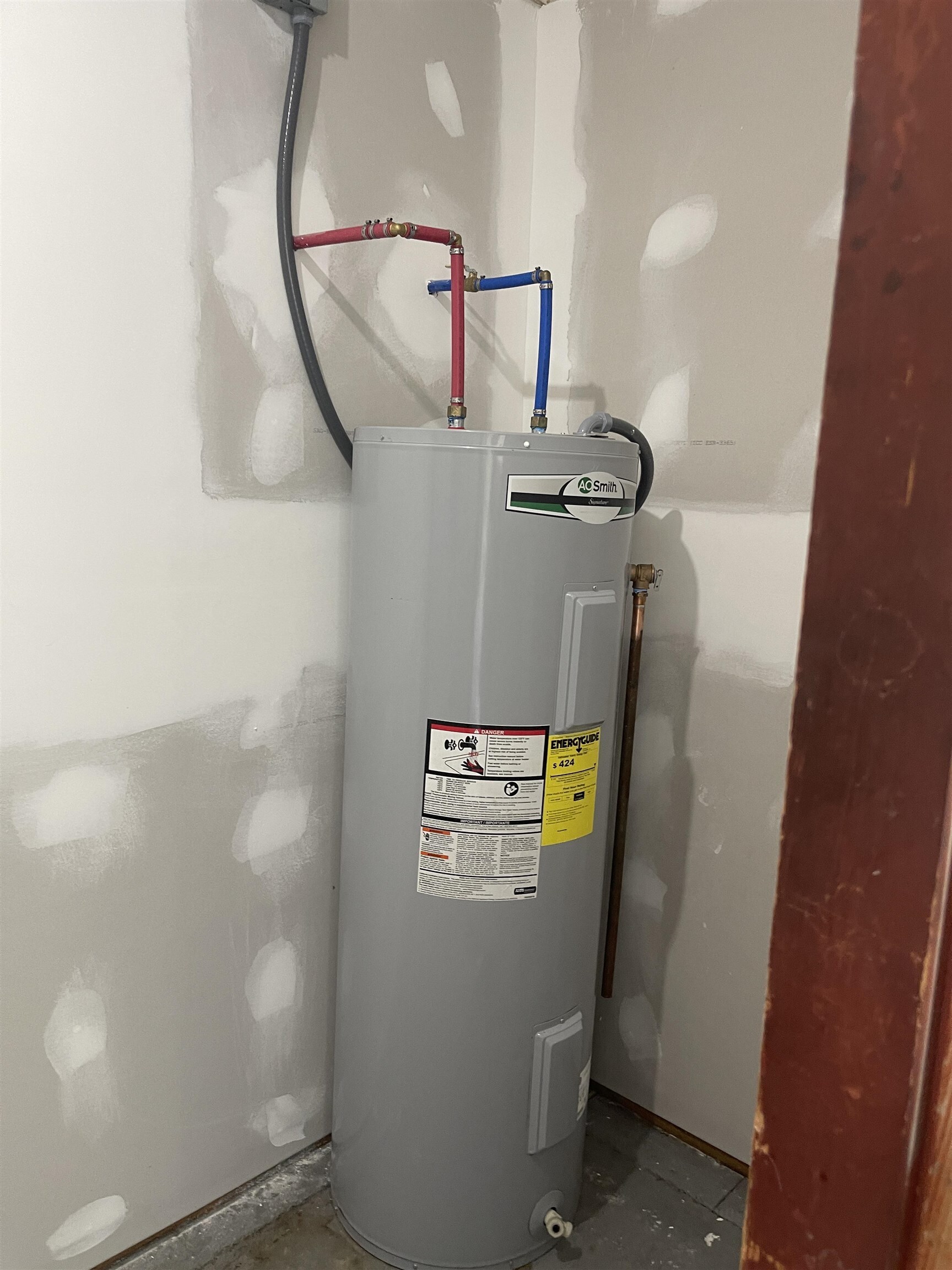 44 Armstead Drive Stockbridge, GA 30281 - Photo 16 of 20 a view of storage and utility room with washer and dryer