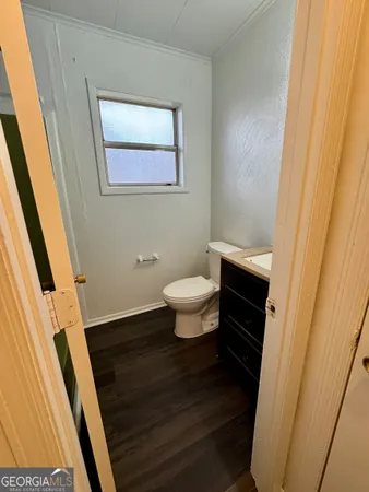 a bathroom with a sink and a toilet