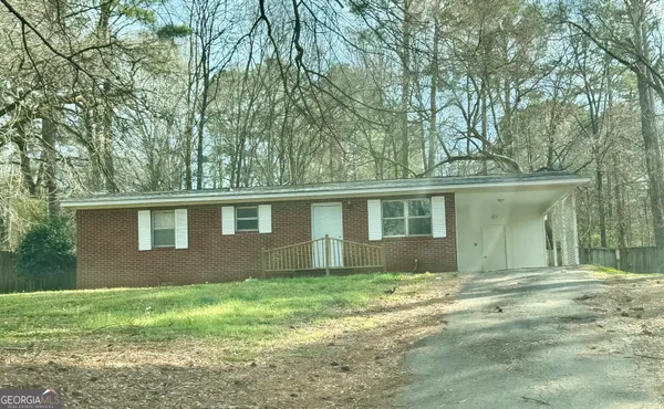 front view of a house and a yard