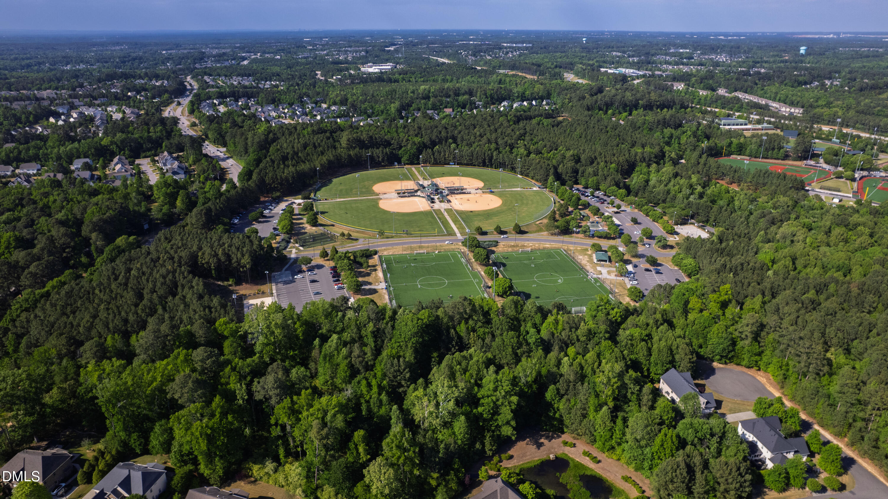 313 Karpen Lane Cary, NC 27519 - Photo 84 of 86 an aerial view of a residential houses with outdoor space and trees all around