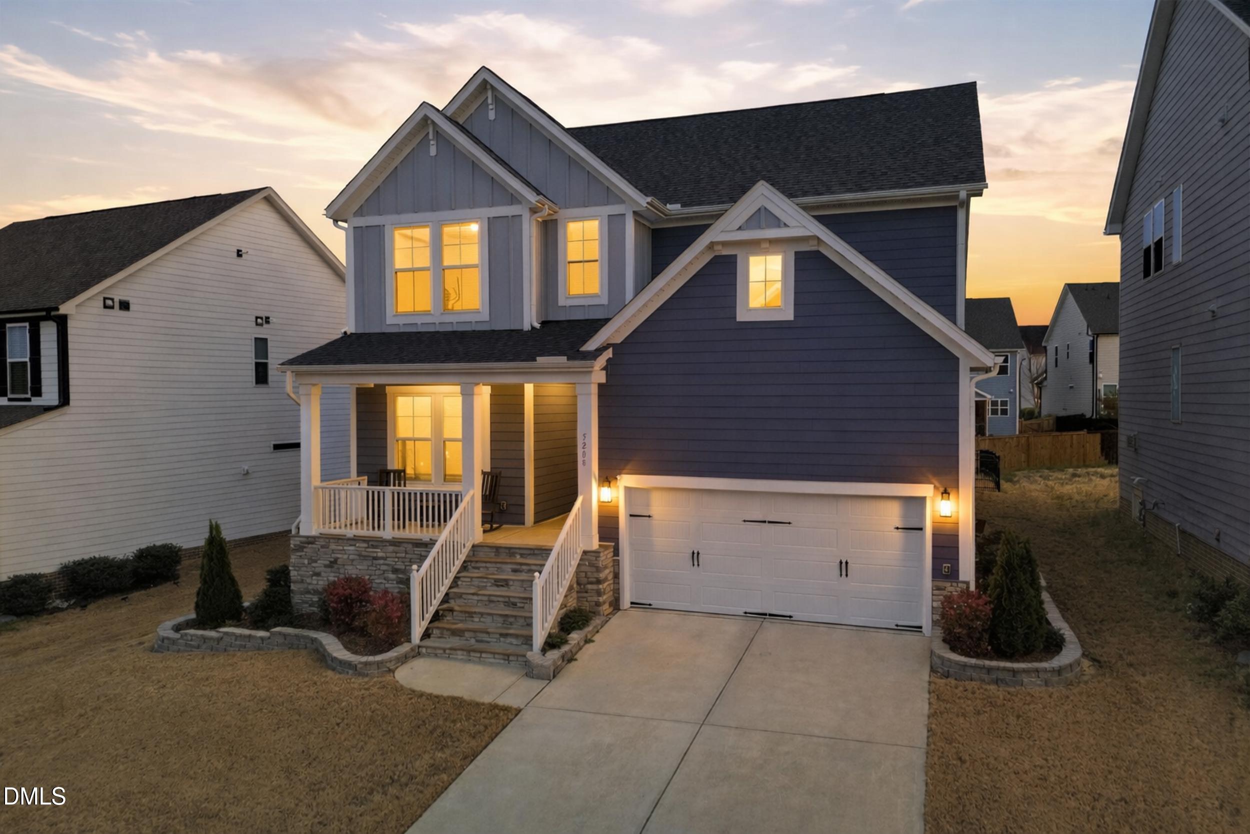 5208 Windmere Chase Drive Raleigh, NC 27616 - Photo 2 of 42 a view of a house with a patio