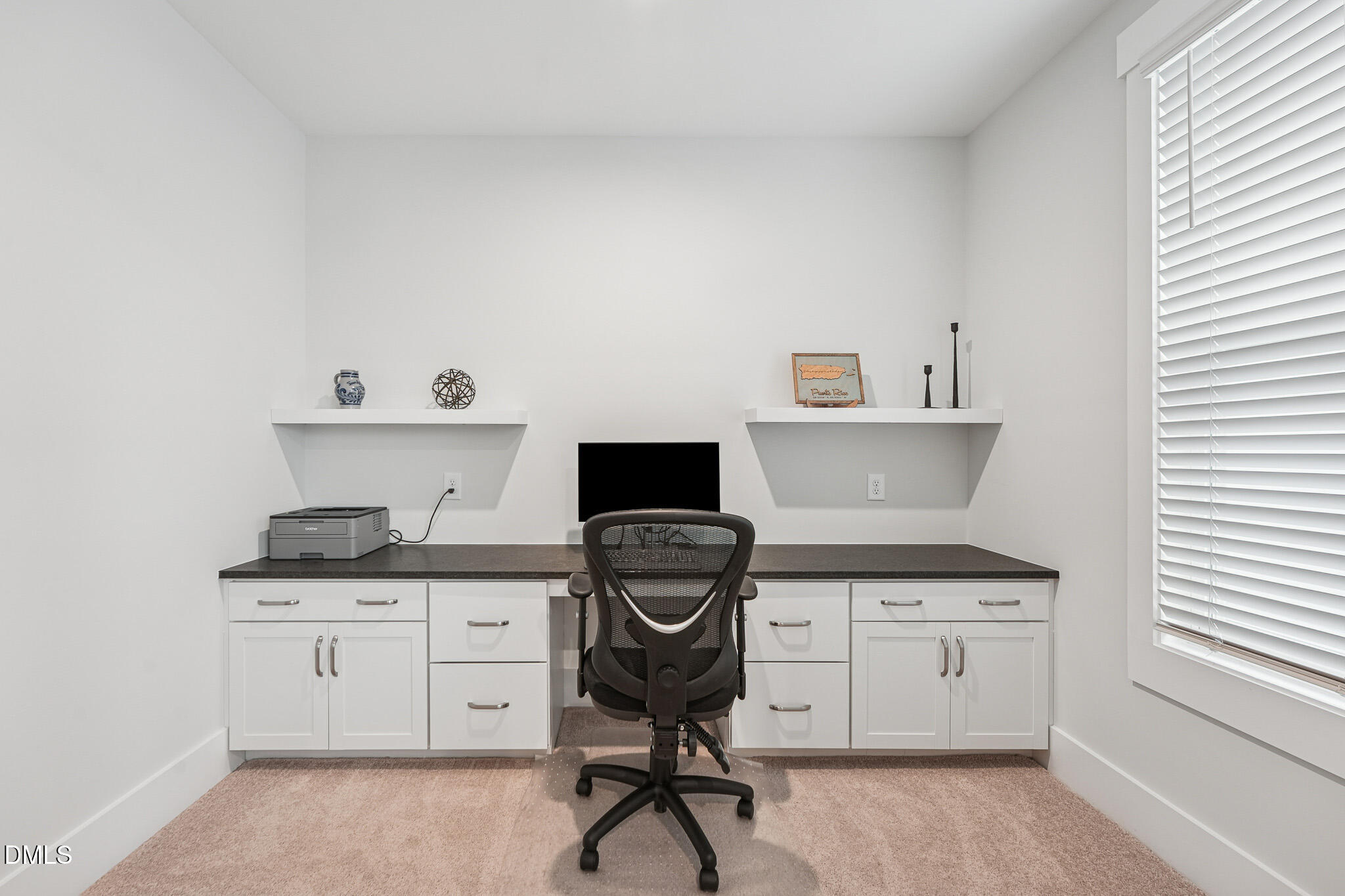 5208 Windmere Chase Drive Raleigh, NC 27616 - Photo 26 of 42 a view of workspace with cabinets wall painting
