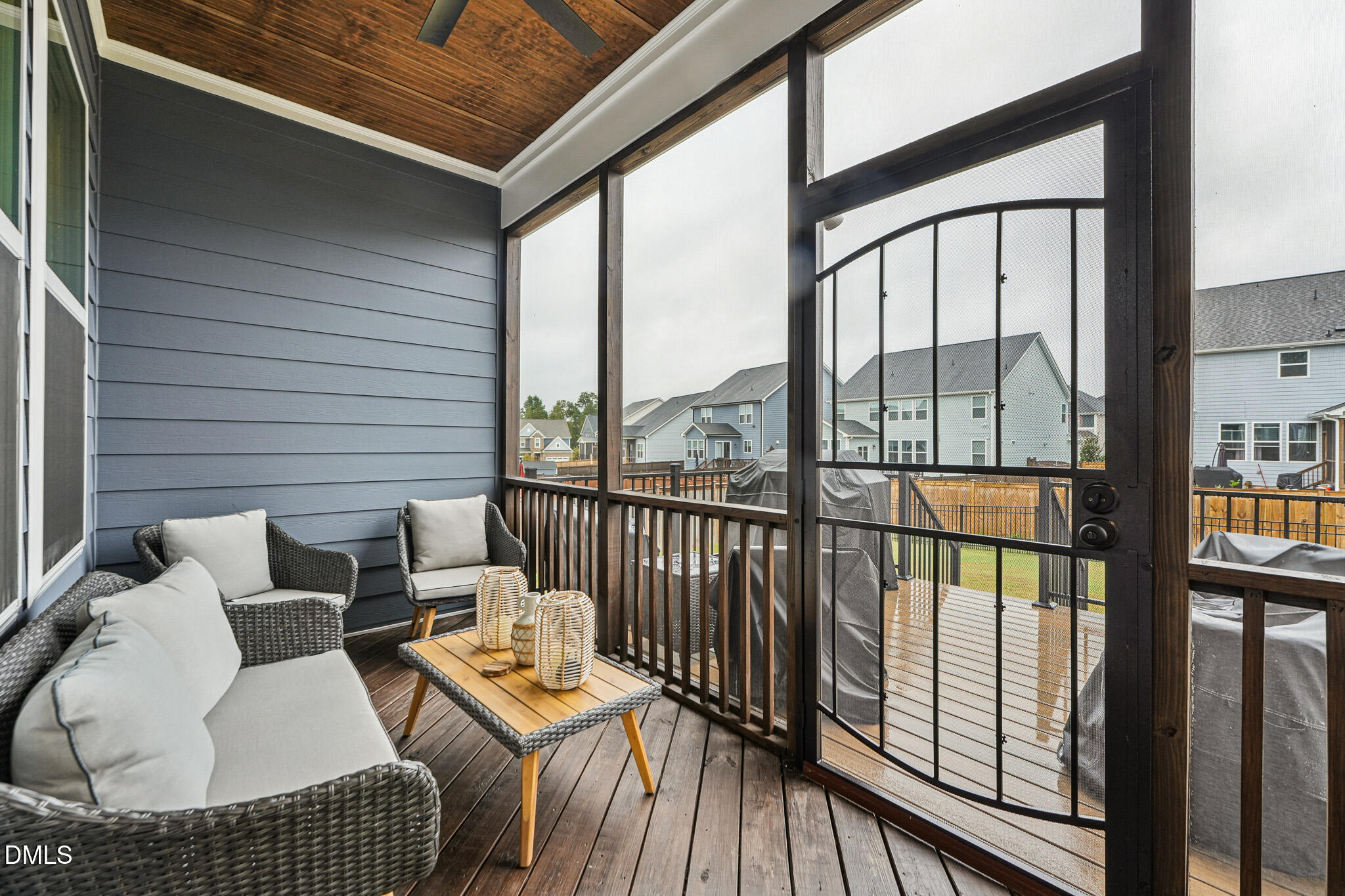 5208 Windmere Chase Drive Raleigh, NC 27616 - Photo 31 of 42 a balcony with furniture and floor to ceiling window