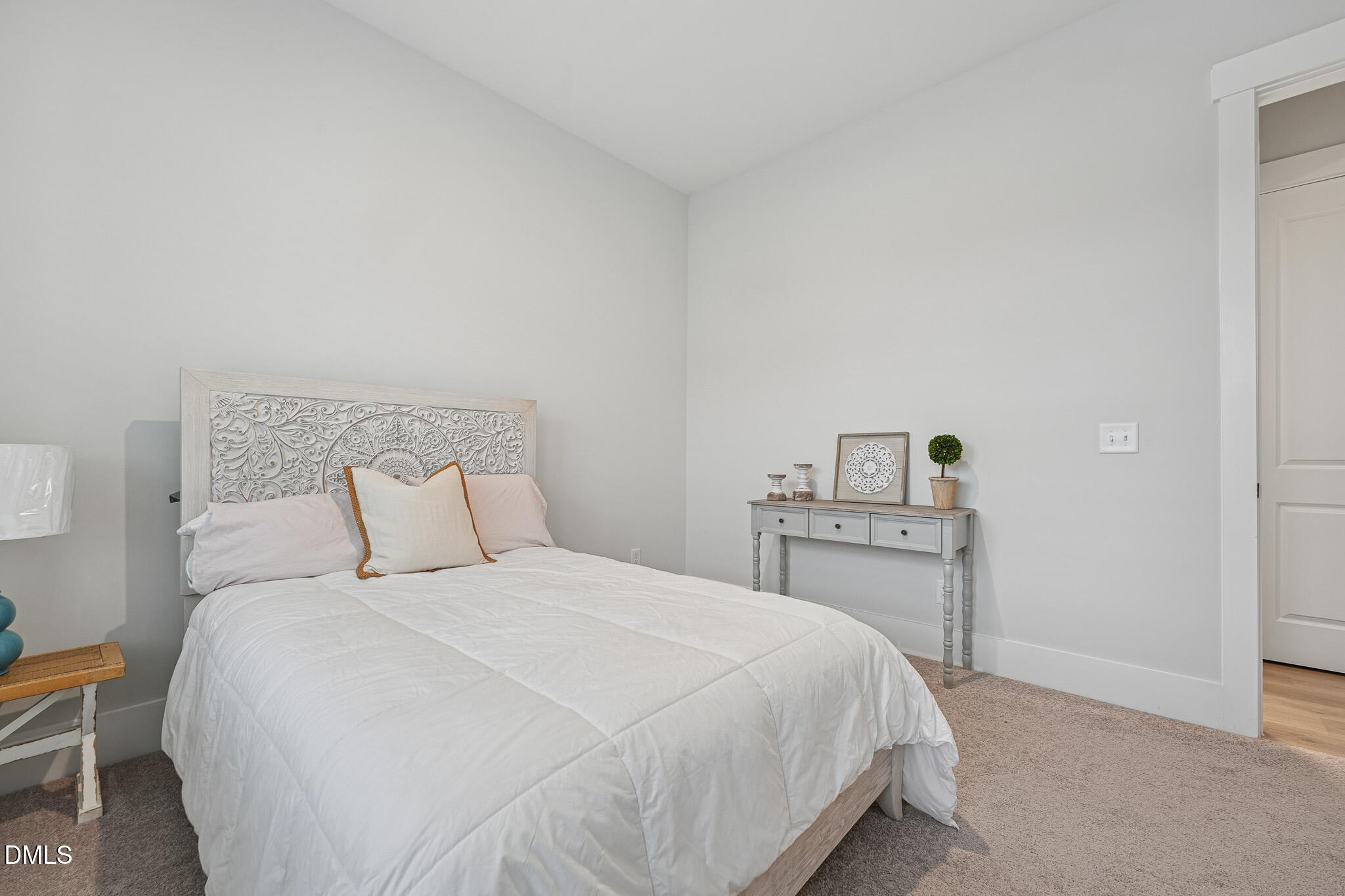 5208 Windmere Chase Drive Raleigh, NC 27616 - Photo 6 of 42 a bedroom with a bed and a desk