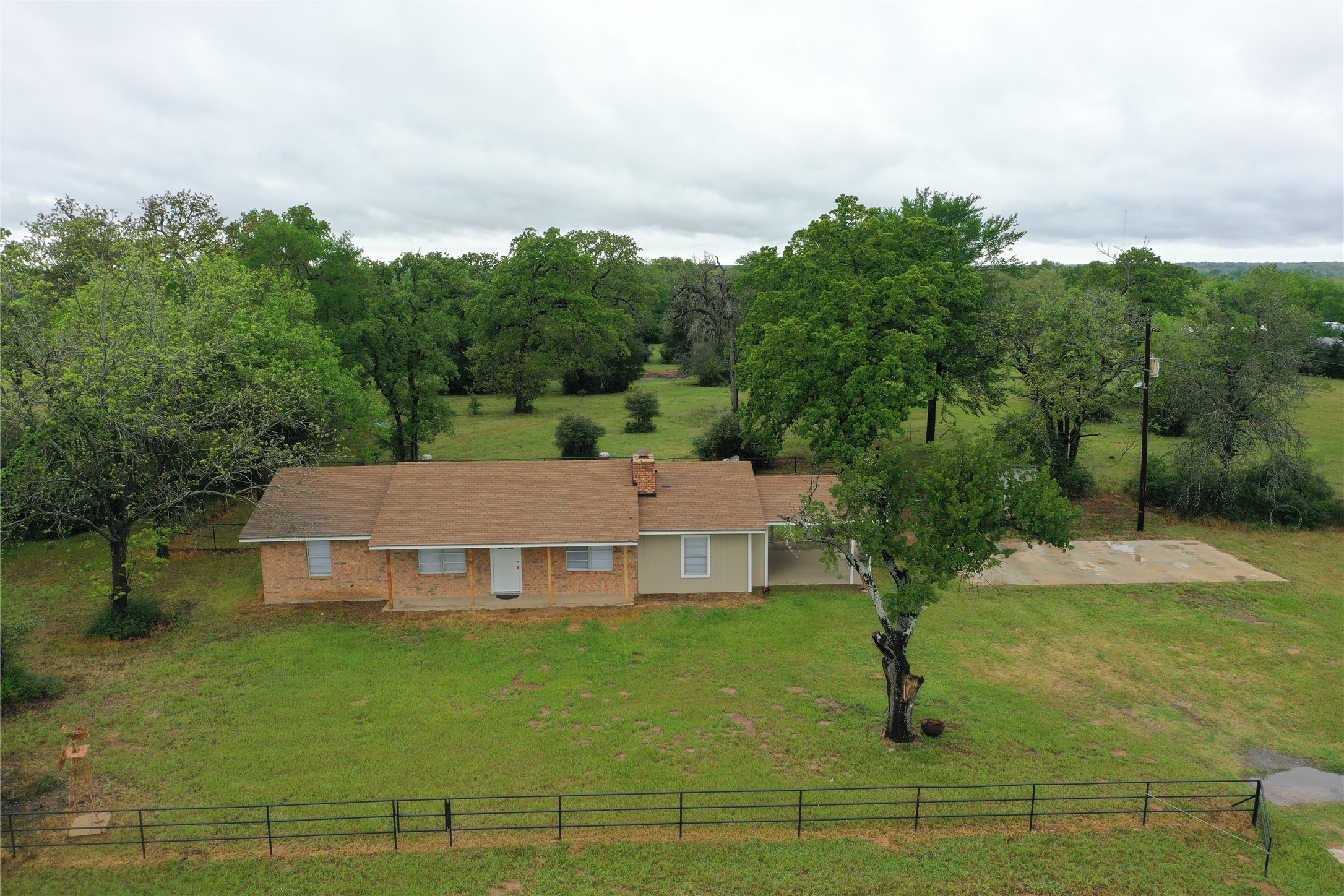 18043 Sterling Robertson Dam Road Thornton, TX 76687 - Photo 2 of 11 an aerial view of a house with a yard
