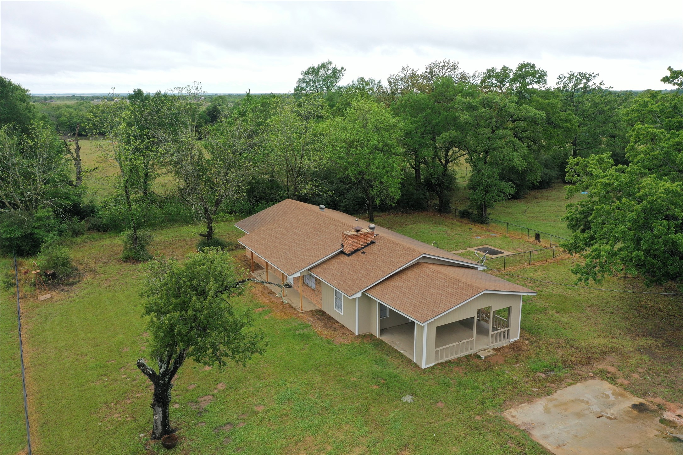 18043 Sterling Robertson Dam Road Thornton, TX 76687 - Photo 3 of 11 a view of a patio with a yard