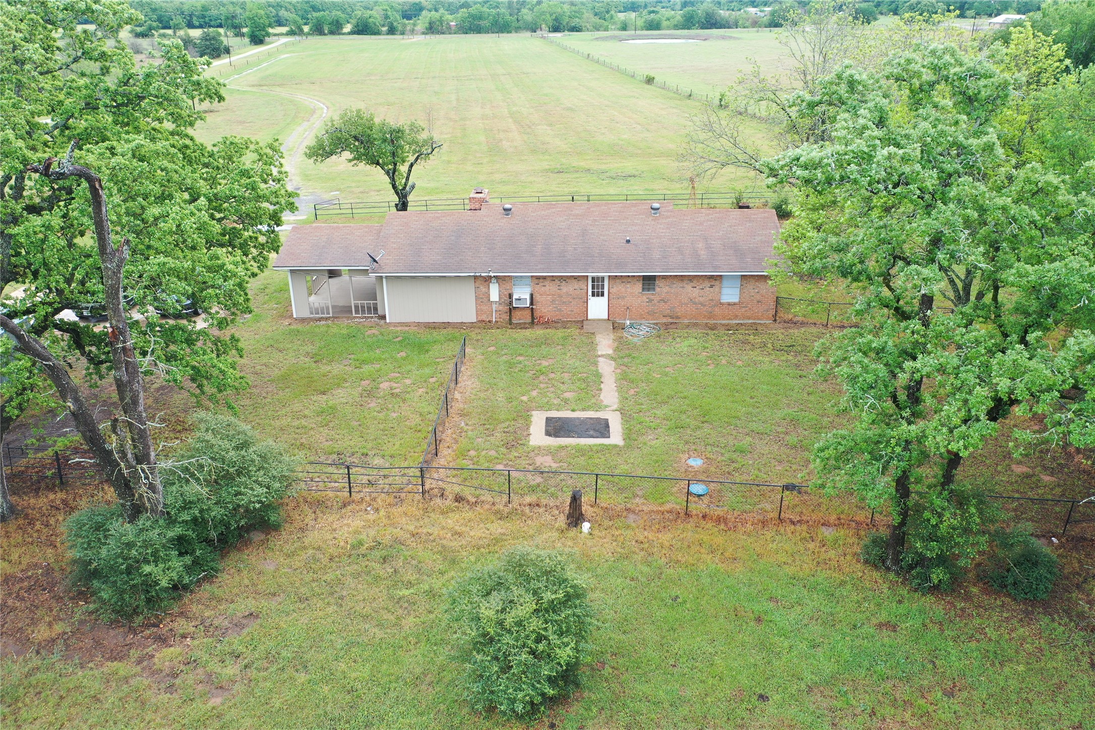 18043 Sterling Robertson Dam Road Thornton, TX 76687 - Photo 4 of 11 an aerial view of a house