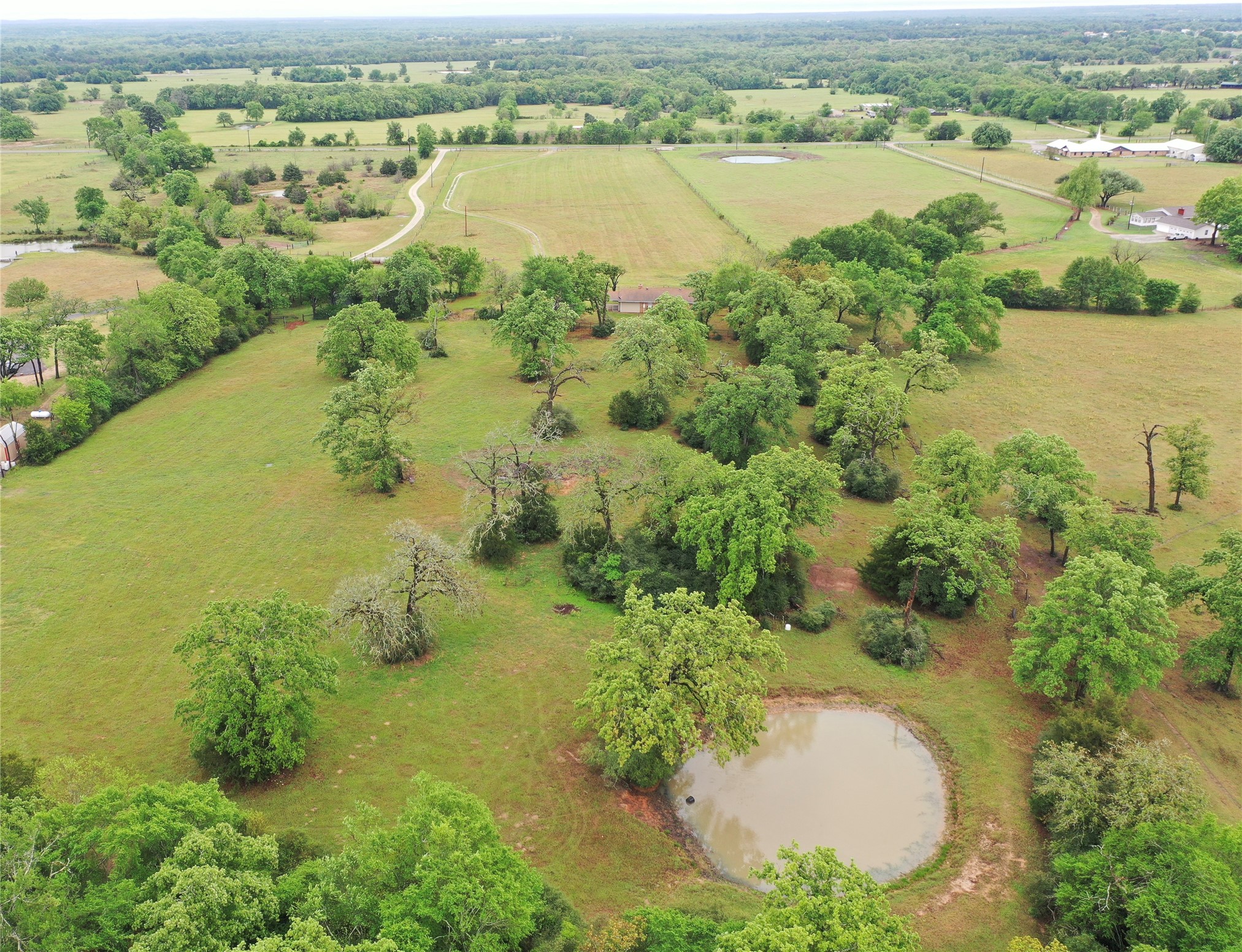 18043 Sterling Robertson Dam Road Thornton, TX 76687 - Photo 5 of 11 an aerial view of lake residential houses with outdoor space and swimming pool