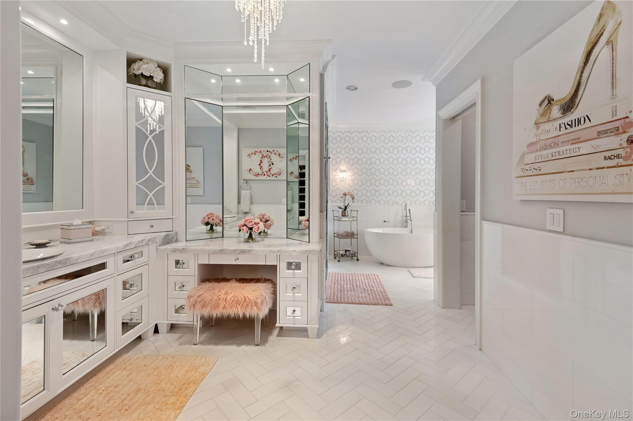 471 Woodbury Road Cold Spring Harbor, NY 11724 - Photo 16 of 36 a en suite bathroom with a double vanity sink a mirror and a shower