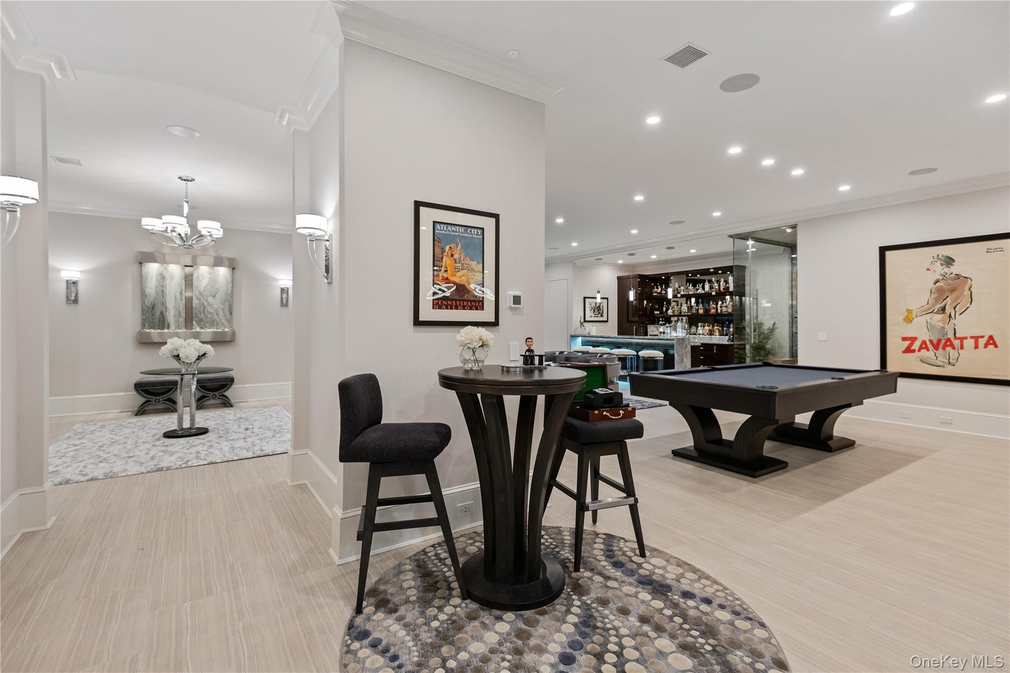 471 Woodbury Road Cold Spring Harbor, NY 11724 - Photo 29 of 36 a living room with stainless steel appliances furniture a rug and a view of kitchen