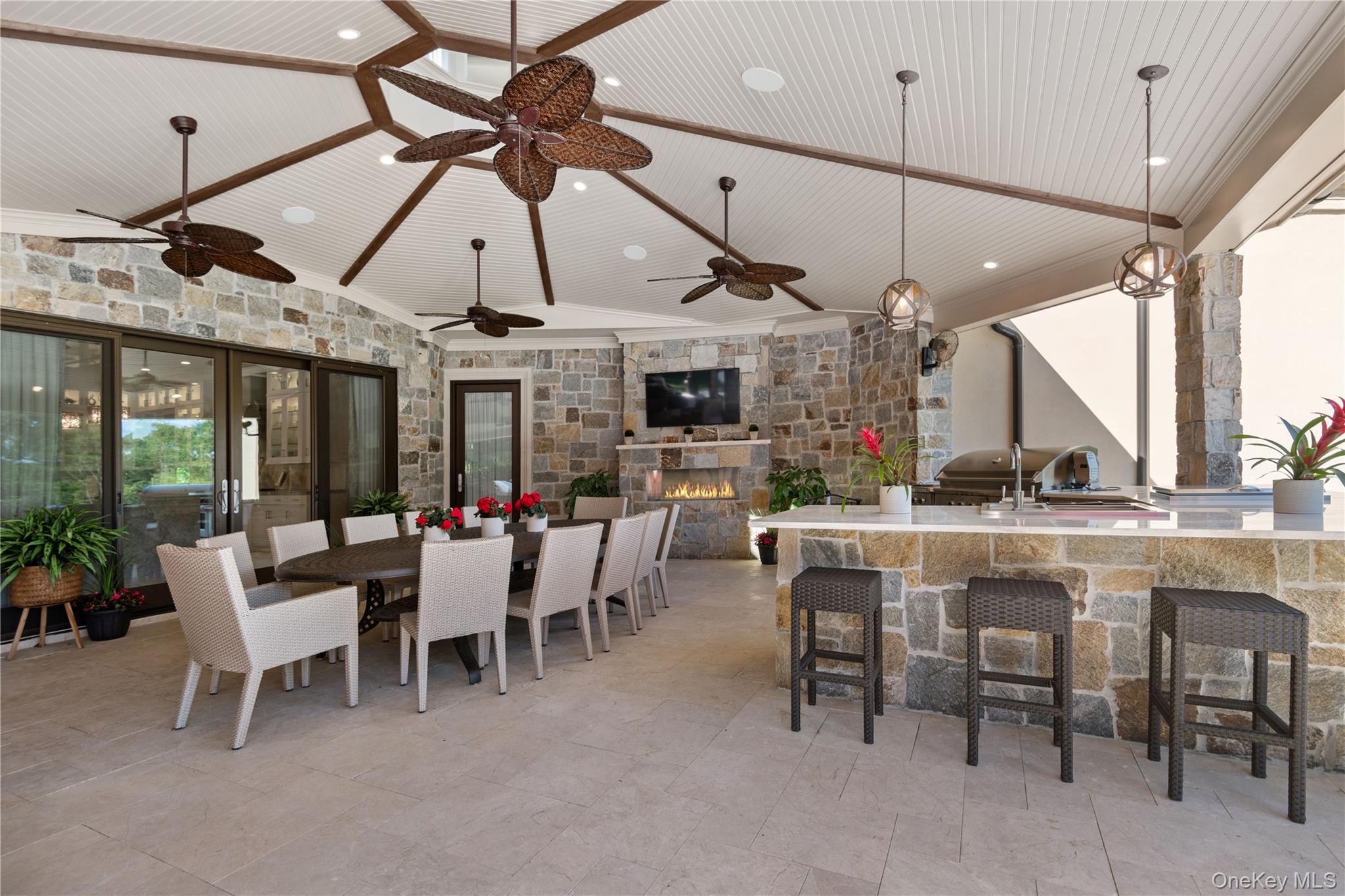 471 Woodbury Road Cold Spring Harbor, NY 11724 - Photo 31 of 36 a group of people sitting in white patio