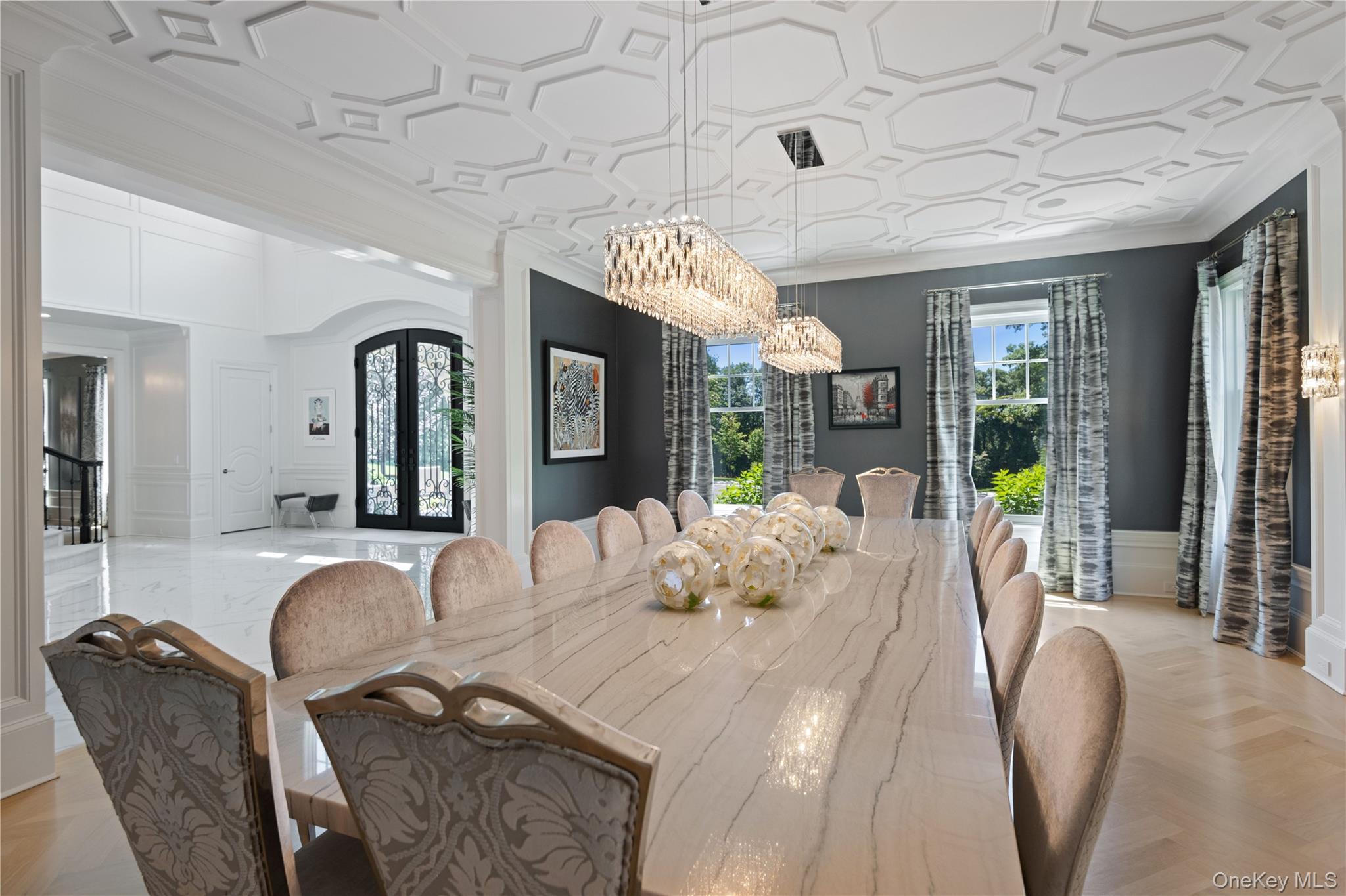 471 Woodbury Road Cold Spring Harbor, NY 11724 - Photo 5 of 36 a view of a dining room with furniture wooden floor and chandelier