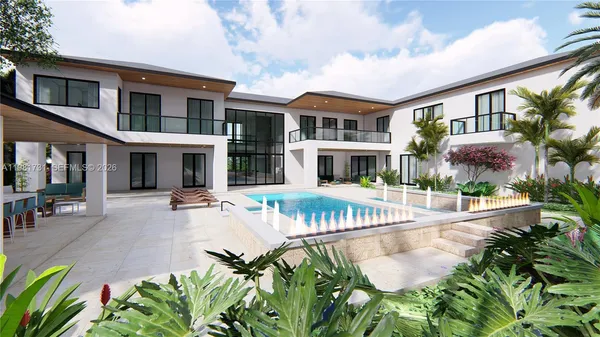 a view of a house with sitting area and garden