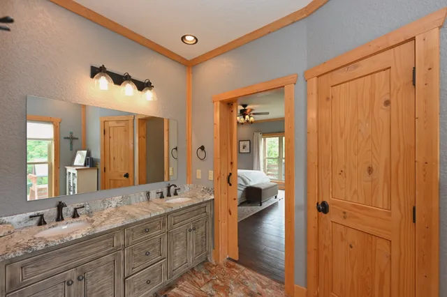 a view of a livingroom with furniture and cabinet