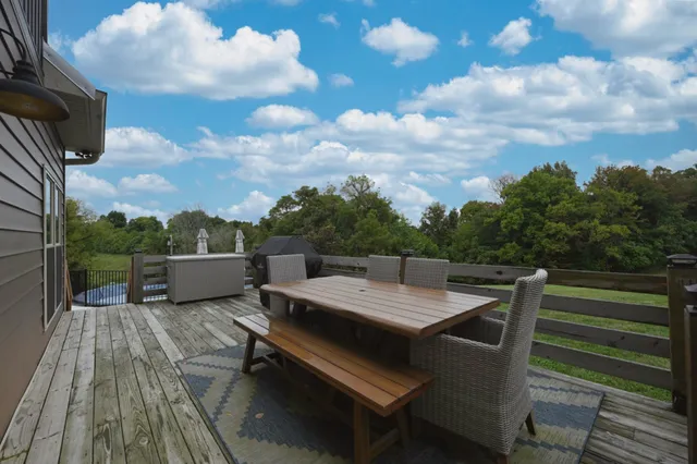 a view of a lake with a yard