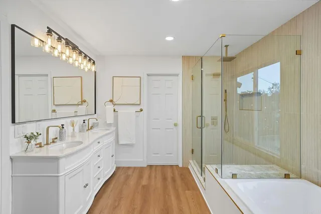 a bedroom with two beds and a window