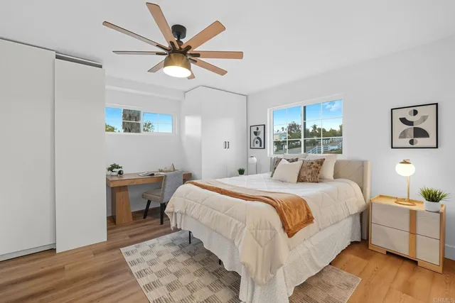 a view of a swimming pool with an outdoor space and seating area