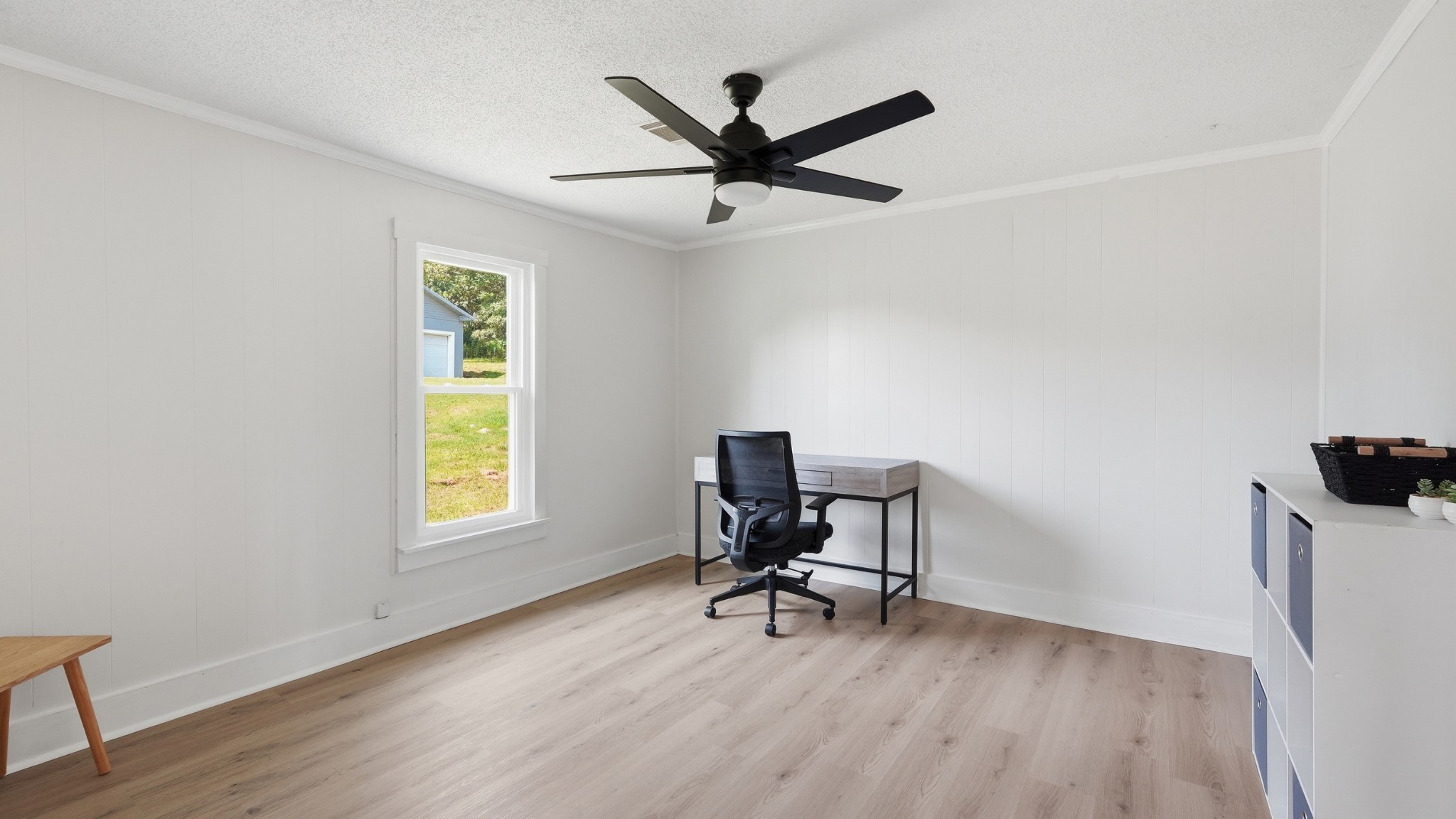 469 Fred Cooper Road McMinnville, TN 37110 - Photo 30 of 46 a work room with wooden floor and a window