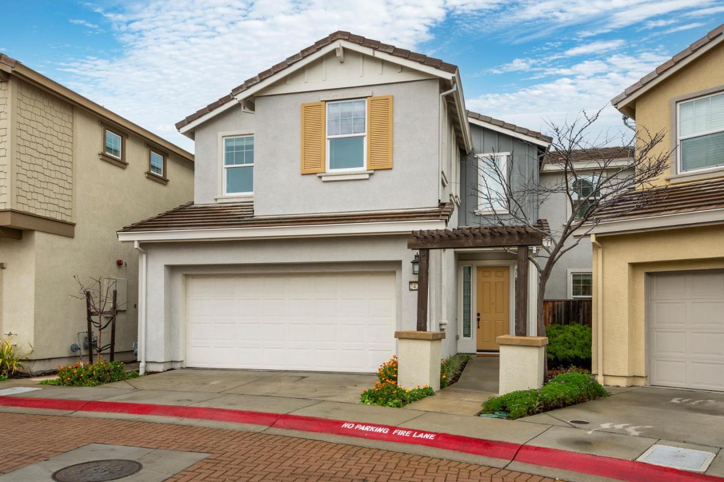 24252 Nora Circle Hayward, CA 94545 - Photo 1 of 51 a front view of a house with a yard and garage