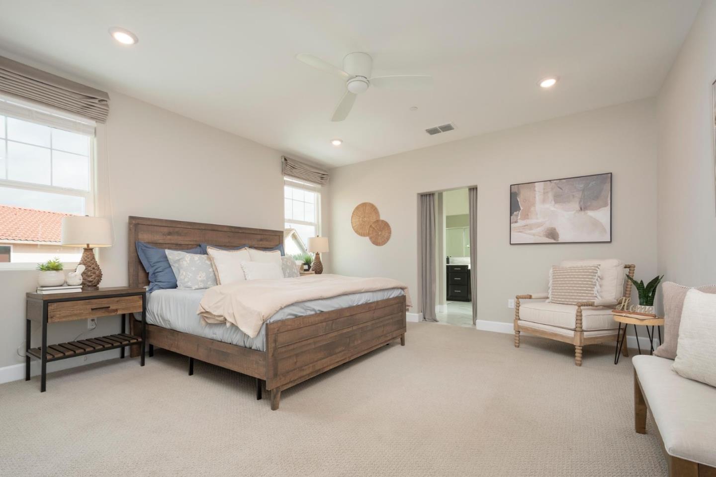 24252 Nora Circle Hayward, CA 94545 - Photo 19 of 51 a spacious bedroom with a bed and a couch