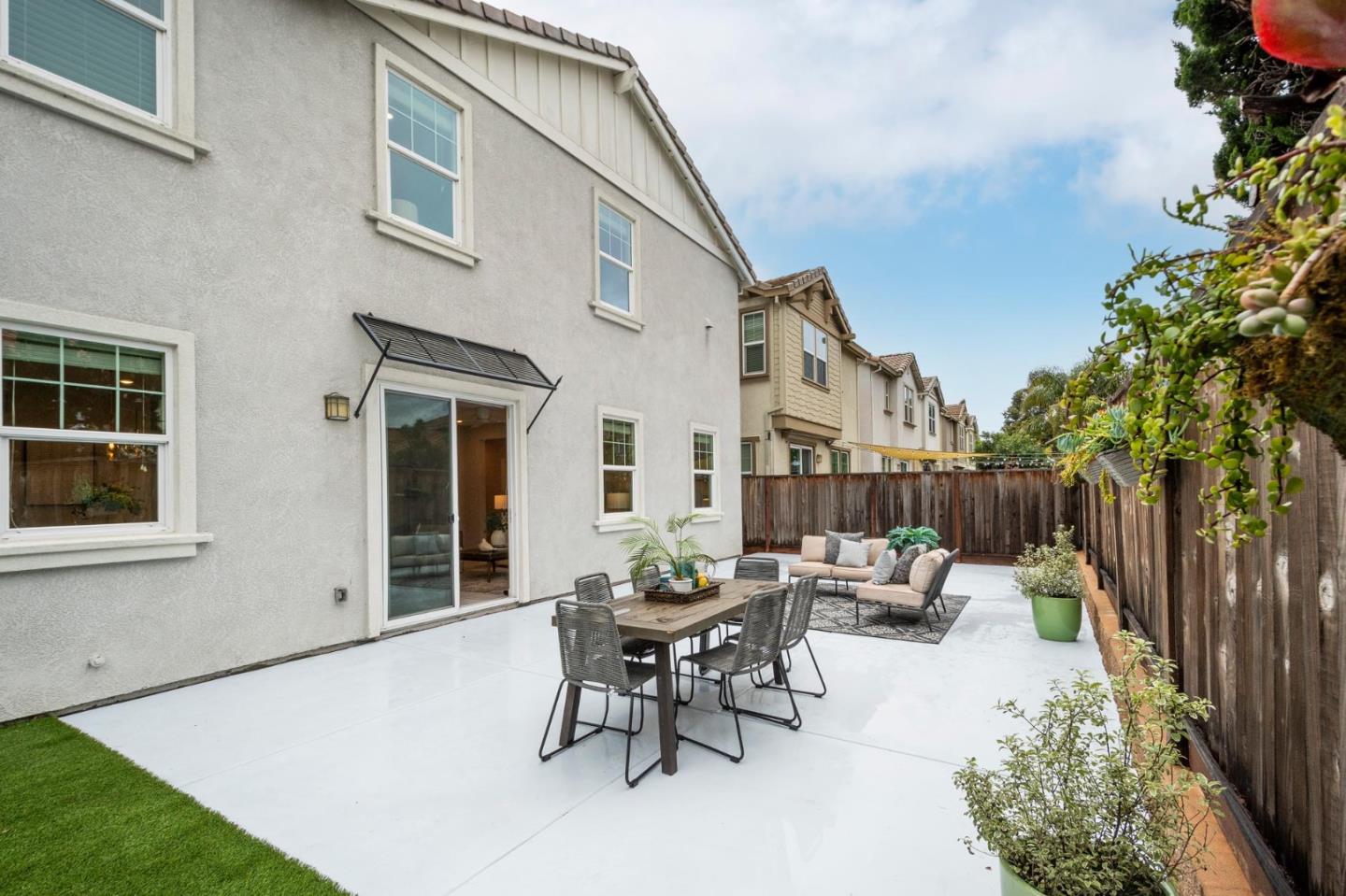 24252 Nora Circle Hayward, CA 94545 - Photo 36 of 51 a view of a patio with table and chairs and potted plants
