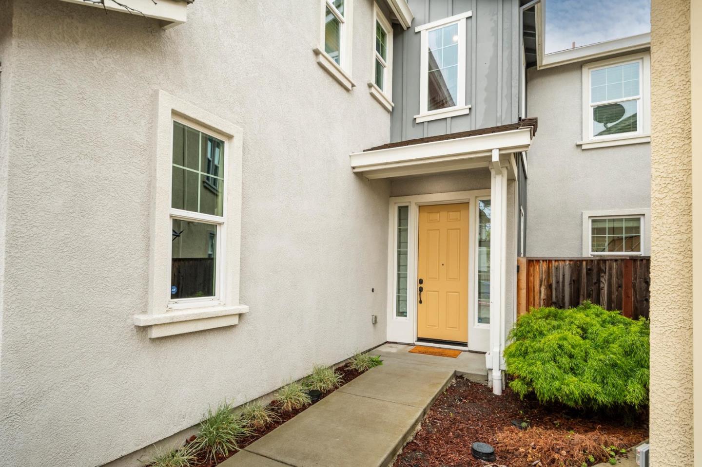 24252 Nora Circle Hayward, CA 94545 - Photo 5 of 51 a front view of a house with a yard