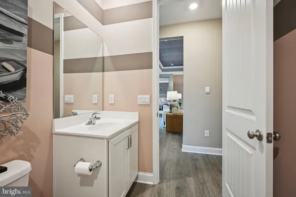 a en suite bathroom with a sink and mirror