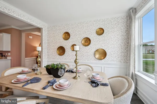 a bathroom with a granite countertop sink a mirror and shower