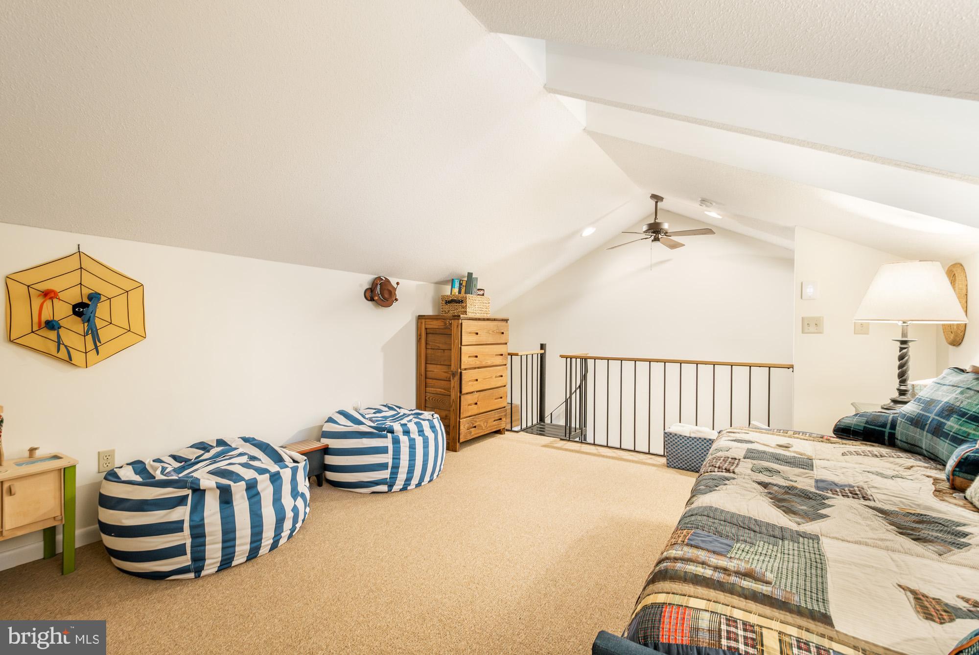 6 Winding Way, Unit 19C McHenry, MD 21541 - Photo 24 of 62 a bedroom with furniture and a baby crib